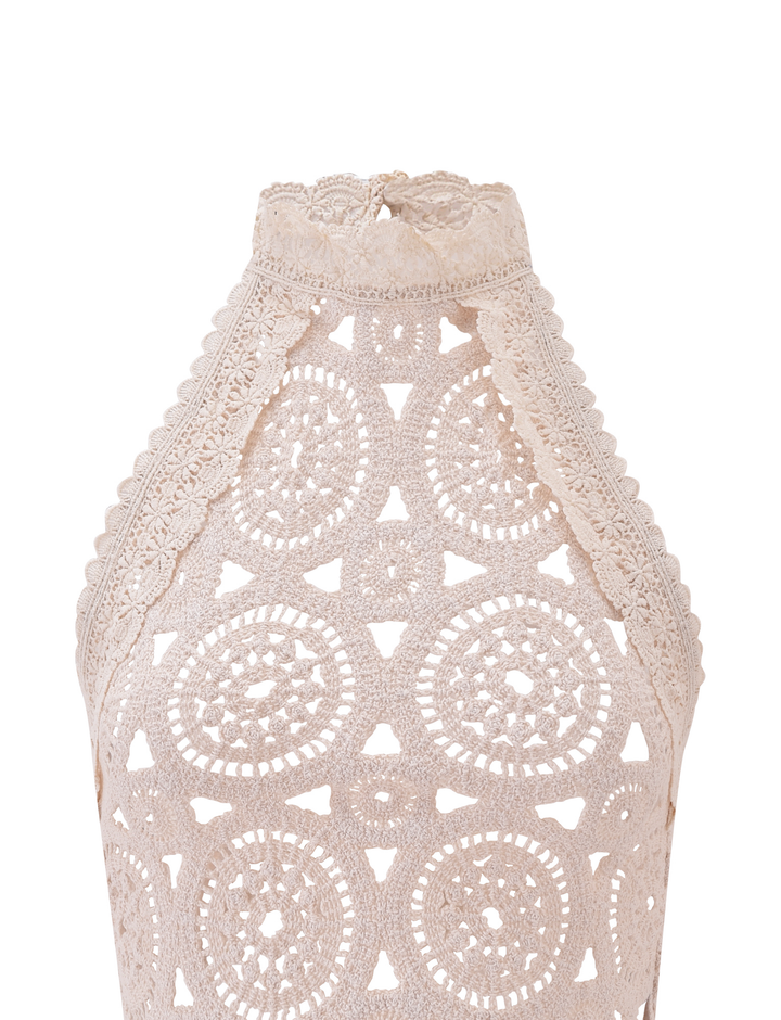 "SYNTHIA NĖRINĖ VIRŠUTINĖ DALIS - KREMAS" can be rewritten as "SYNTHIA LACE TOP - CREAM".